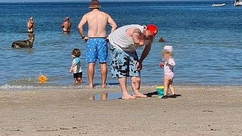 A family photo at the beach caused a stir online following reports of a shark (Image: SES Chelsea Unit/Facebook)