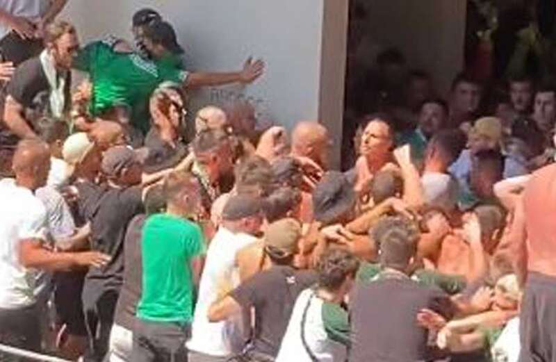 Mayhem as French club's fans fight among THEMSELVES at match against Rodez