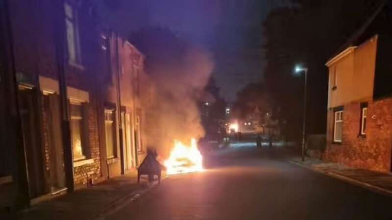 Homes evacuated and cars torched in night of chaos across seaside town