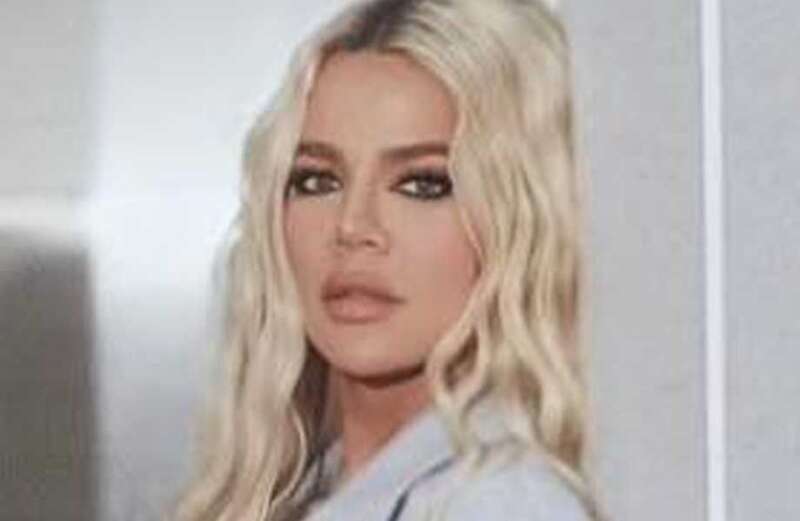 Khloe's tiny waist drowns in baggy sweatpants as she teases new clothing drop