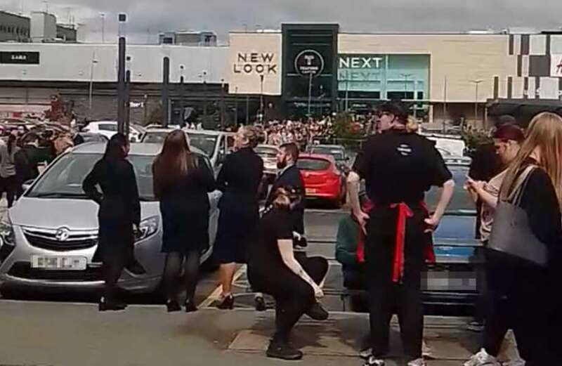 Shoppers evacuated after 'threat' as officers search UK town centre