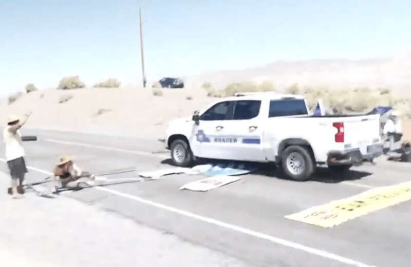 US cops show Brit police how to deal with eco yobs as they drive through barrier