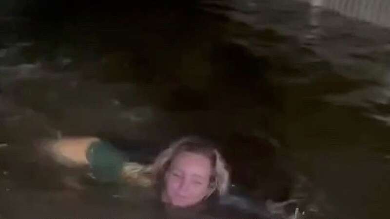 Woman swims through flooded Florida street as Hurricane Idalia causes chaos