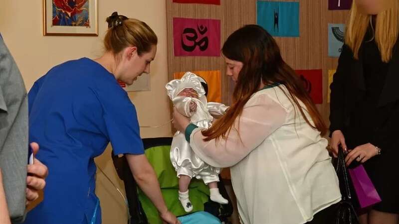 Lucy Letby pictured adjusting the blanket on baby Alvin