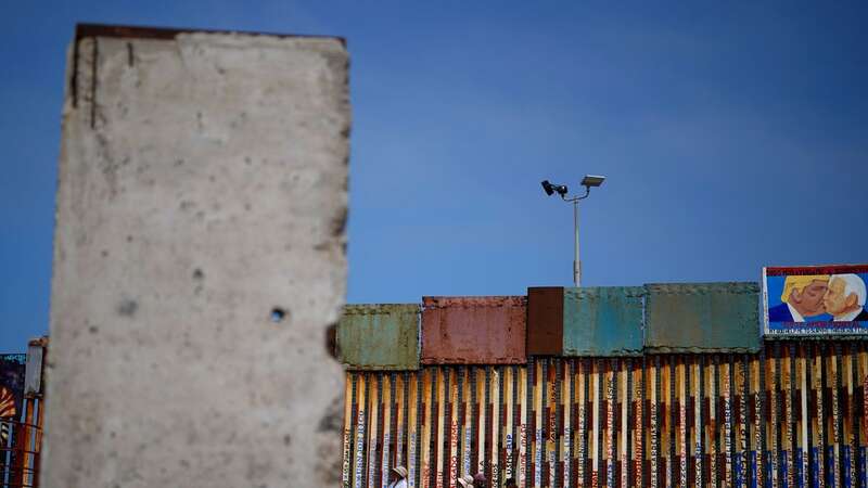 The 3-ton pockmarked, gray concrete slab sits between a bullring, a lighthouse and the Mexican/United States border wall (Image: AP)