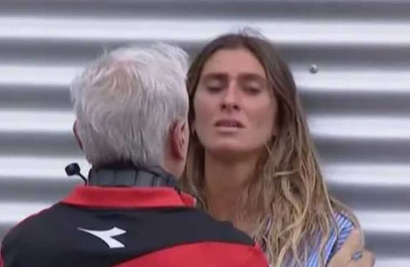 MotoGP champ's girlfriend in tears and is consoled after boyfriend is run over