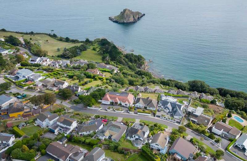 Our neighbour's 'shipping container' extension will block our seaside views