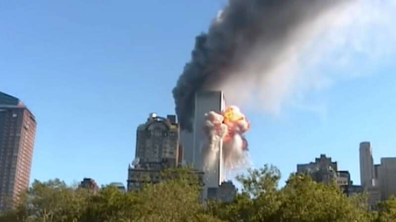 Captured from a boat, the camera looks up towards the towers from amongst a crowd of shocked onlookers (Image: Kevin Westley /Youtube)