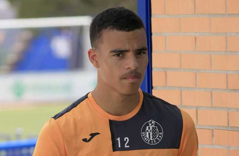 Mason Greenwood pictured at training in seven-year-old boots before debut