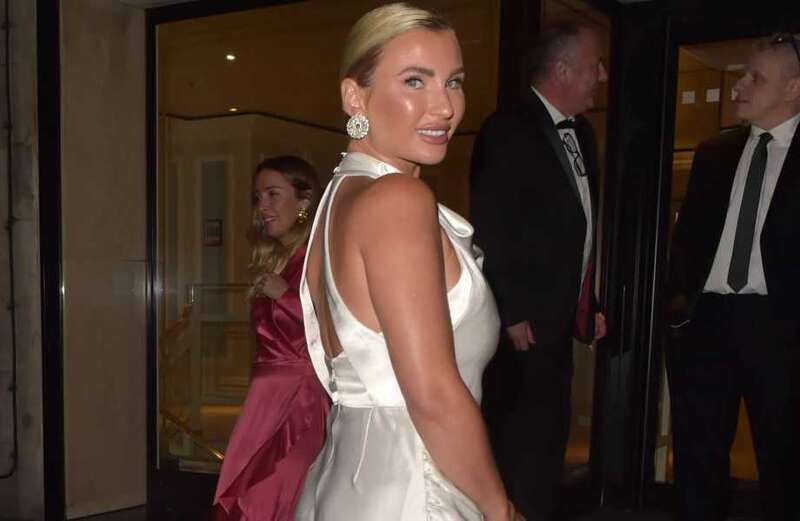 Billie Faiers looks stunning as she flashes her legs in daring thigh-split dress