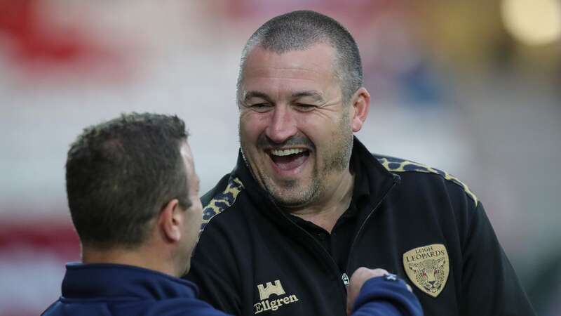 Leigh Leopards head of rugby Chris Chester shares a joke with Hull KR boss Willie Peters - his former Wigan team-mate (Image: James Heaton/News Images)