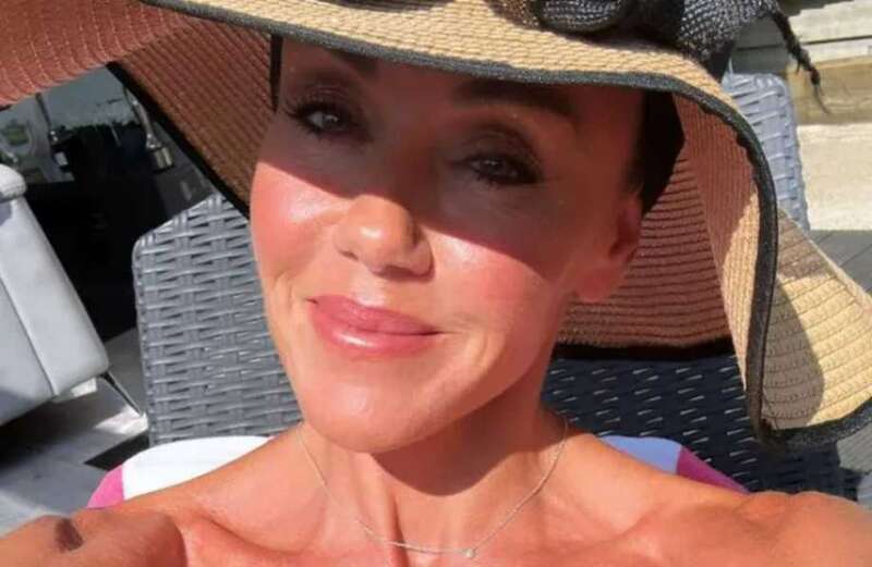 Michelle Heaton strips off to sunbathe in the heatwave after brave alcohol and cancer battles