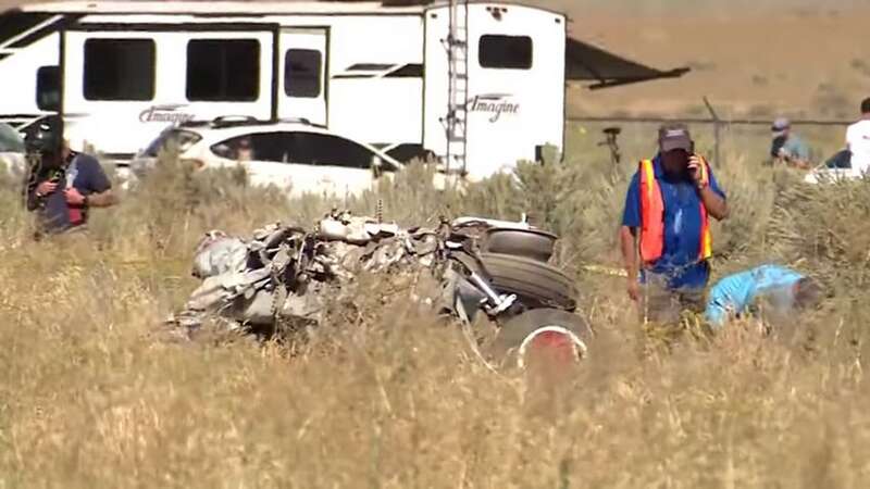 Emergency crews amid the wreckage of the collision