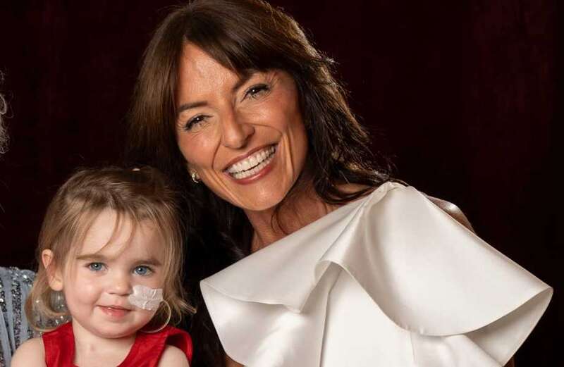 Davina McCall gives lollipop to girl, 2, who had life-saving heart transplant