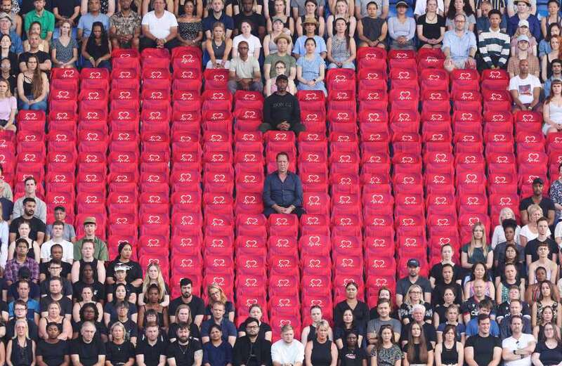 Arsenal legend amongst empty stadium seats to raise awareness for heart issues