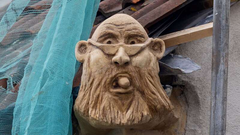 A gargoyle of the town council leader (Image: Tom Wren SWNS)