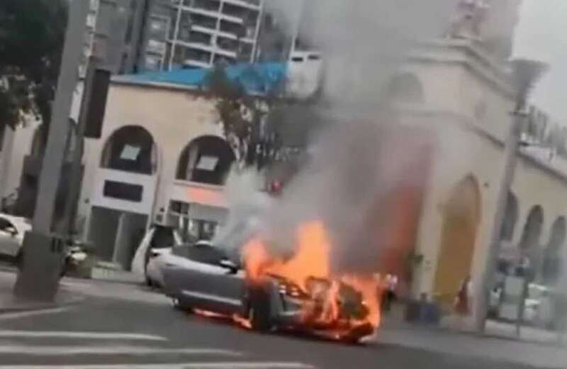 Terrifying moment plush £200k Porsche EV bursts into flames during rush hour