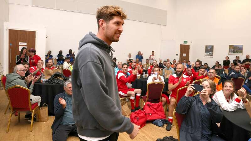 John Stones surprised a crowd of 300 homeless football players (Image: Julian Hamilton/Daily Mirror)