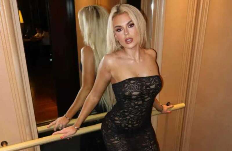 Tallia Storm sends fans wild as she poses in see-through lace dress