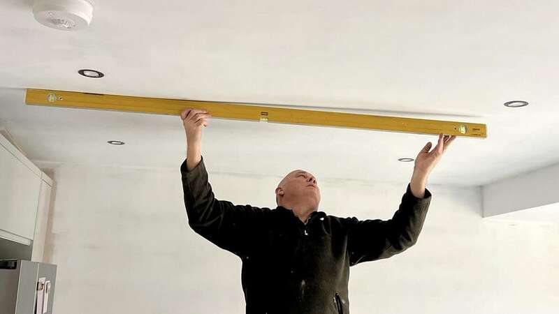 Ceilings in Louisa and Edwards home in Wiltshire were left uneven (Image: Louisa Benton / SWNS)