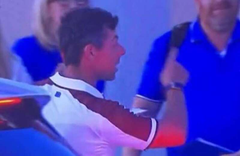 Furious McIlroy bundled into car after altercation with USA caddie at Ryder Cup