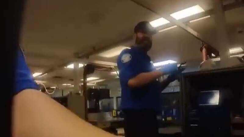 The TSA agents saw the camera right away (Image: Youtube/KazSawyer456)