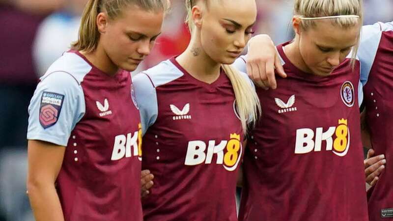 Players, officials and fans take part in a minutes silence in memory of Maddy Cusack prior to the Barclays Women