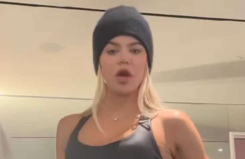 Khloe shows off her real butt in skintight leggings as she works out in home gym