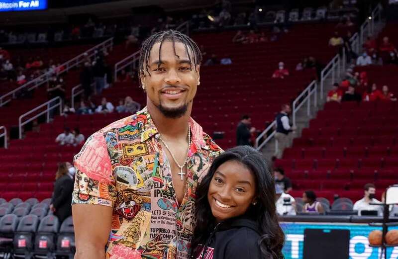 The record-setting gymnast is married to NFL started Jonathan Owens