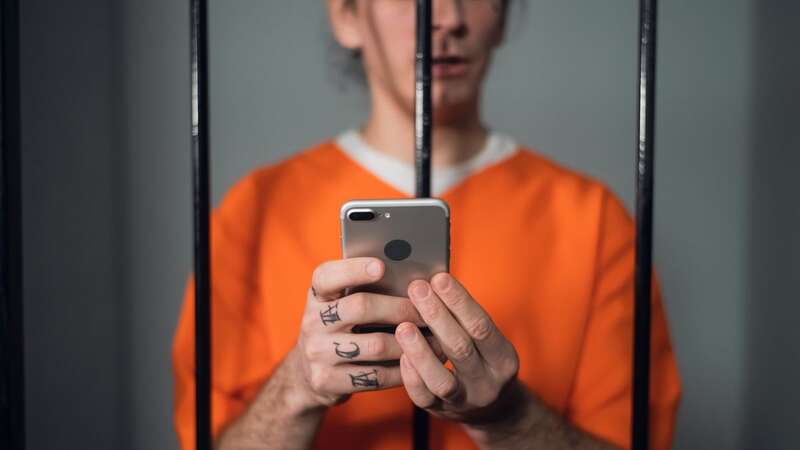 Inmates are prohibited from having phones with them in their cells (Image: Getty Images/iStockphoto)