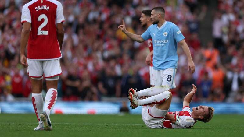 Mateo Kovacic was booked after fouling Martin Odegaard (Image: ADRIAN DENNIS/AFP via Getty Images)