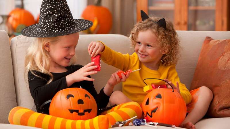 The parents have a special tradition for the Halloween sweets (stock photo) (Image: Getty Images/Blend Images)