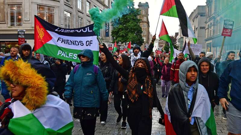 Palestine protest turns ugly as bottles and flares hurled at cops - live updates