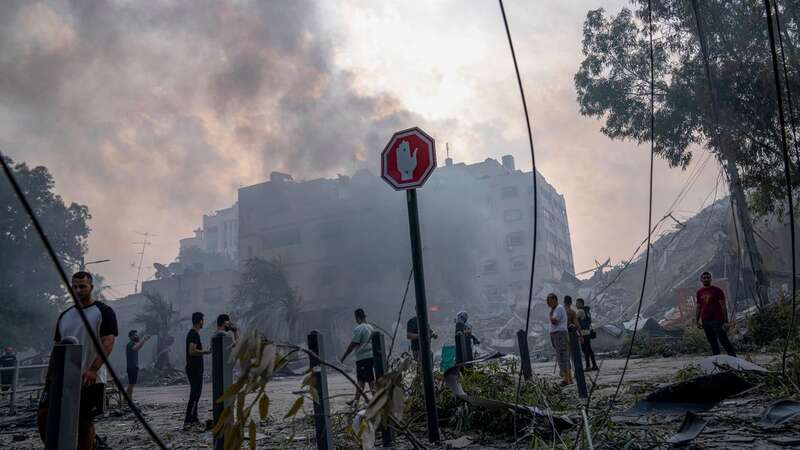 Children among dead after convoy attacked as thousands flee Gaza - live updates