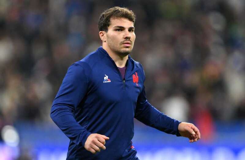 Why is France captain Antoine DuPont wearing a scrum cap?