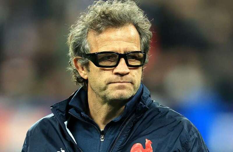 Why does France rugby coach Fabien Galthie wear thick-rimmed glasses?