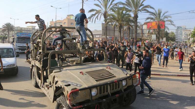 A shell from Israeli artillery explodes over Dahaira, a Lebanese border village with Israel (Image: AP)