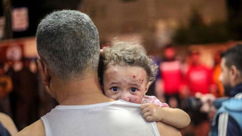 Palestinians injured in Israeli raids arrive in Khan Yunis (Image: Getty Images)