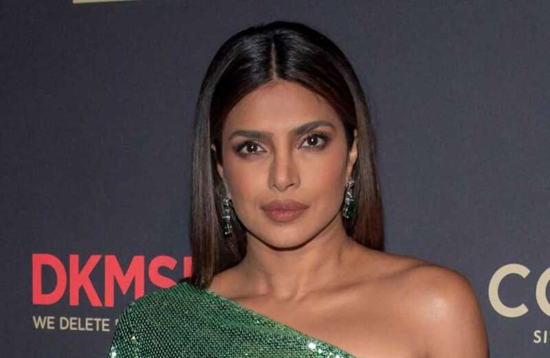 Priyanka Chopra stuns in emerald dress with thigh-high split for fundraiser