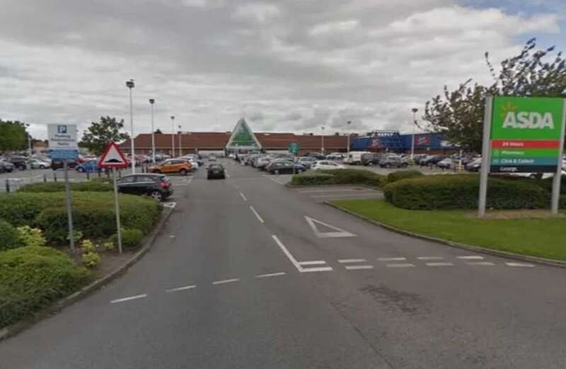 A dozen police vehicles including a forensics van were spotted in the car park