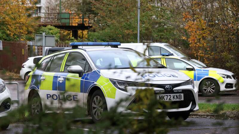 Police at Douglas House in Wigan (Image: Men Media)