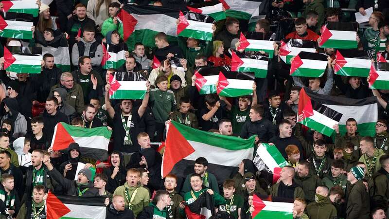 Celtic fans held up Palestine flags during their game against Atletico Madrid (Image: PA)