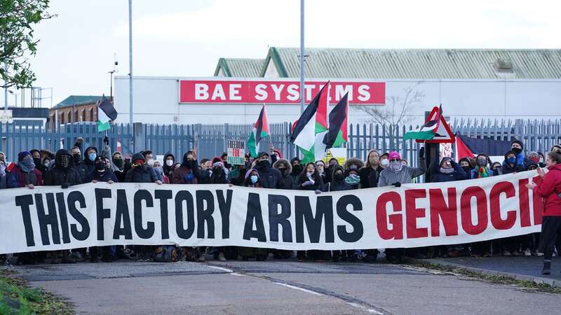 Trade unionists and protesters form a blockade outside BAE Systems in Rochester in Kent (Image: PA)