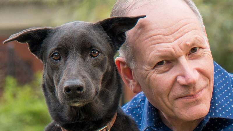 Dr Clive Wynne with his faithful companion