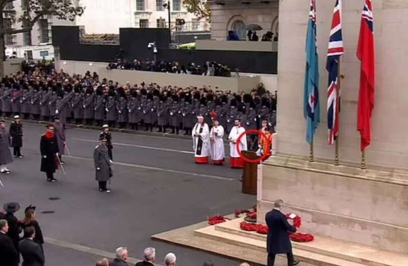 It came after the King, 74, marched into the solemn service with his son by his side