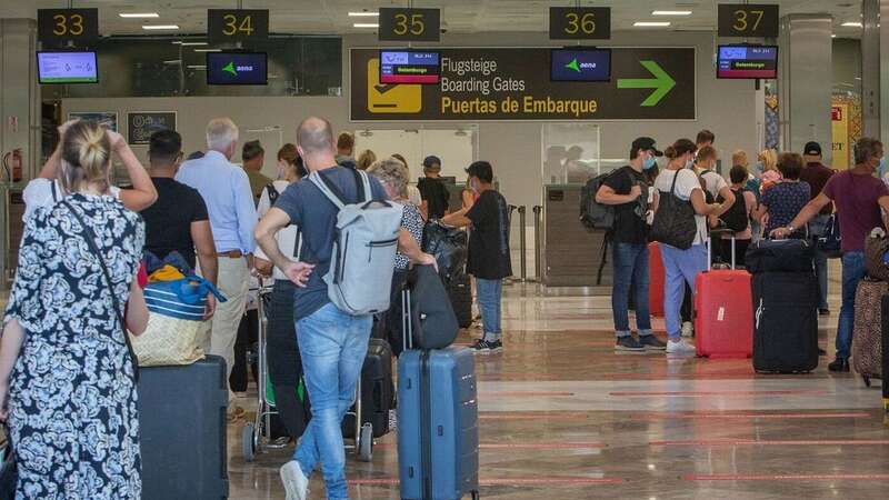 British passport holders have encountered queues at Tenerife Airport since the UK left the EU (Image: AFP via Getty Images)