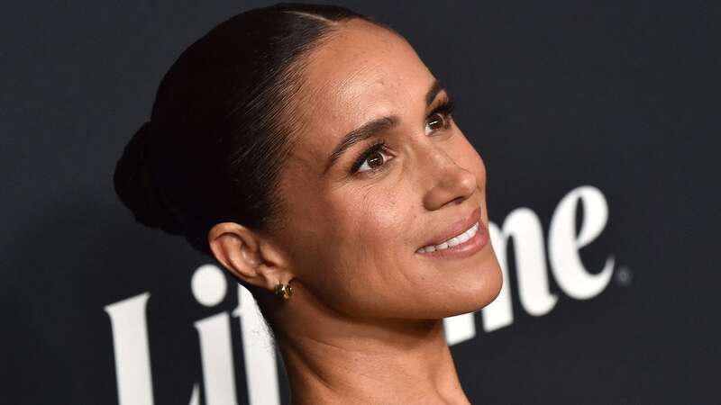 Meghan Markle looked glamorous at the event (Image: AFP via Getty Images)