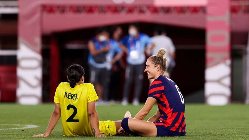 Kristie Mewis and Sam Kerr sit together after Australia