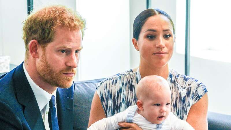 Prince Harry and Meghan Markle holding their baby son Archie (Image: SIPA USA/PA Images)