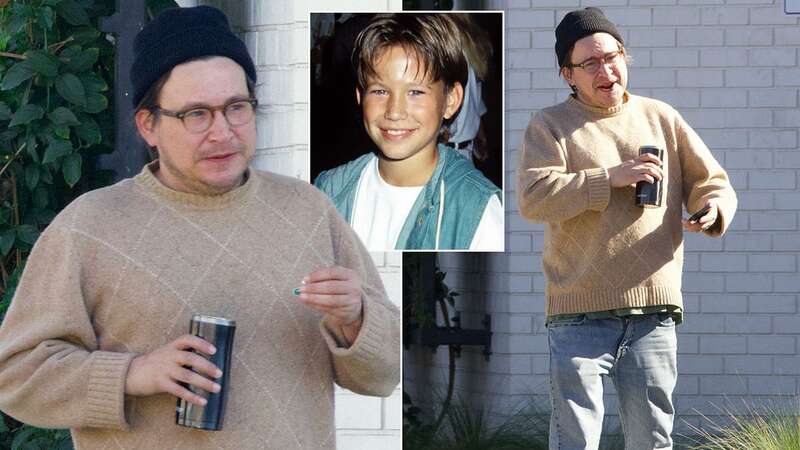 Jonathan Taylor Thomas seen outside his apartment taking pills (Image: SplashNews.com)